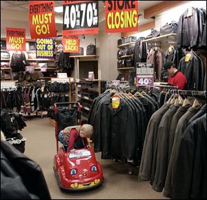 The Franklin Park store, where Zachary Lawrence waits impatiently for his father, is likely to be among the last to close.