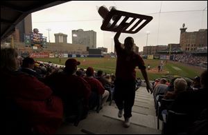 Cotton candy probably was one of the good-selling concessions at Fifth Third Field yesterday, but what the crowd of 12,250 mostly wanted was a Mud Hens  victory on Opening Day.