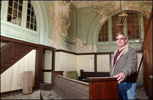 Ralph Hahn and other members of Historic Homes of Defiance want to help restore the city's two-story railroad depot.