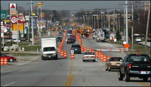 Rov Photo by Don Simmons Apr 15, 2004  Construction along Wooster St in Bowling Green just  west of I 75