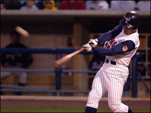 Andy Barkett smashes a two-run homer in the sixth inning for Toledo. 