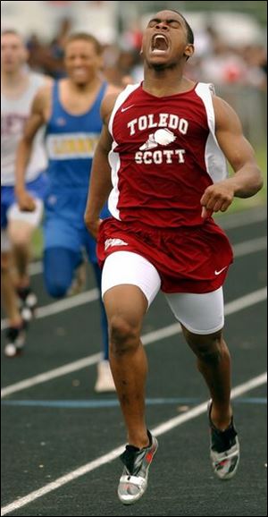 Scott's Romen Walton speeds to a win in the 400 meters.