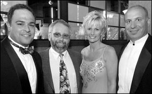 From left, Gus Mancy, Ty Szumigala, Terri Schmakel, and Craig Joseph at the Taste of the Nation at gumbo's Bayou Grille.