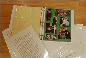 Items going into the time capsule show teen life in the early 21st century.