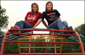 Ariel, left, valedictorian at Bedford High, and Ivy, valedictorian at Monroe High.