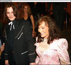 Rocker Jack White, left, served as producer of Loretta Lynn's latest album, 