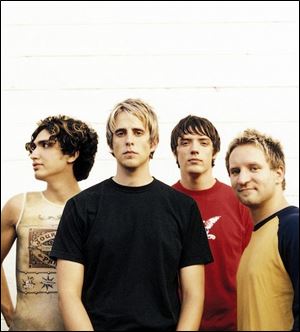 Sanctus Real - from left, Chris Rohman, Matt Hammitt, Steve Goodrum, and Mark Graalman - celebrates its second major-label release with a concert in Toledo on Friday.
