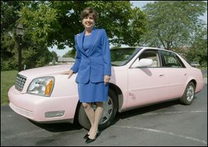 Becky Irvine, a sales director with Mary Kay, has won four pink Cadillacs for her production.