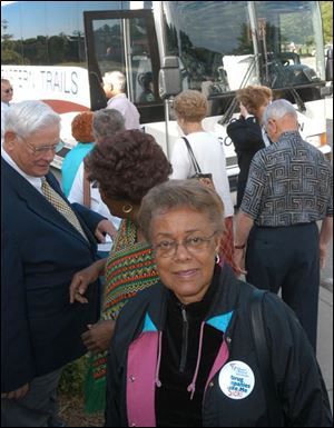Loybelle Poole of Sandusky boards a bus to Canada, where she and other seniors can buy prescription drugs for a fraction of the price that they would be charged in the United States.