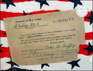 On display is a copy of a post card that Private Duffey sent to his family telling them he was alive in a German prison camp.