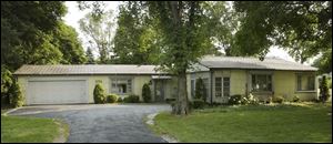 Elizabeth Keener has lived in her South Toledo Lustron since it was built in 1950. Shortly afterward, a family room and garage were added.