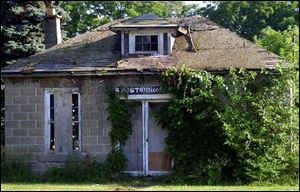 The old Monclova post office was vacated during the 1960s.