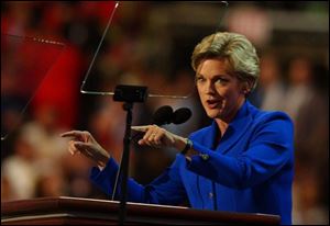 Michigan Gov. Jennifer Granholm addresses the Democratic National Convention at Boston's FleetCenter. She says she takes her responsibility as a role model for girls seriously.