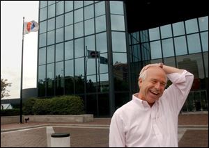 Steven McCracken, outside the firm's downtown headquarters, says O-I is an underperformer with great potential.