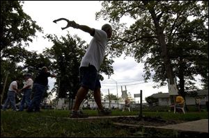 Don Conners of Delta winds for a pitch during the Founders Memorial Tournament held recently in Fulton County. A pretty good grouping in the Founders Memorial Tournament in Wauseon. 