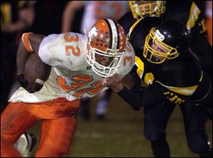 Southview's Eric Thompson is brought down by Northview's Sam Myers.