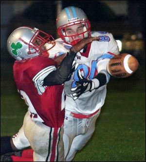 Central's Neil Mitchell, left, breaks up a pass at the goal line intended for Bowsher's Craig Weaks.