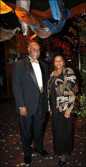 DUET: Ed and Lynn McNeal take a break from dancing the night away.