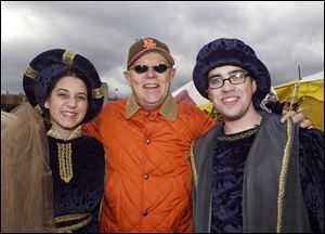 RECALLING THE DAYS OF YORE: Jim Bailey, center, Class of '67, talks to Laura Milarcik, left, and Adam Marier.