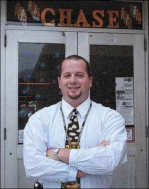 Steve Riddle, principal at Toledo's Chase Elementary School, has seen his students' attendance and test scores increase.