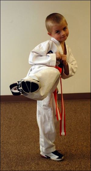Luke Mullin of St. Anthony School is thankful for being able to do Tae Kwon Do.