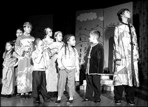 Member of the emperor's court look for the bird with the beautiful voice in the Children's Theatre Workshop production of The Emperor's Nightingale.
