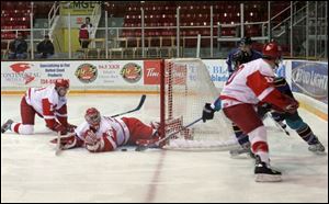 Storm goalie Scott Fankhouser stops Atlantic City s Brett Nowak. Fankhouser had 29 saves in Toledo s victory.
