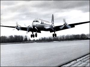 A Capital Airlines DC-4 is the first commercial plane to land at Toledo Express Airport on Jan. 6, 1955.