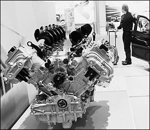 The 10-cylinder engine that will go into BMW's new M5 follows the move to increased power. 
