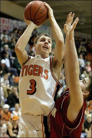 Tory Rasey takes a shot for Liberty Center. Rasey scored four
points in the defensive battle last night against Wauseon.