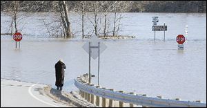 State Rt. 424 near State Rt. 281 in Defiance is awash after the Maumee River overflowed its banks.