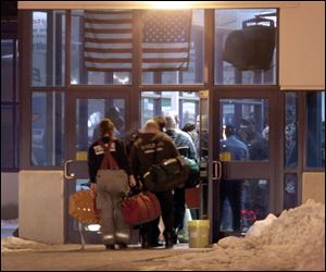 Toledo fire and rescue personnel enter the Jeep plant after the shooting incident at the north-side automaking facility.
