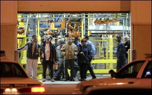 Several hundred workers were in the plant at the time of the shootings. All were sent home shortly after the plant was secured.
