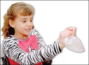 Brooke Beamer, 9, pops
Bubble Wrap with a twist.
