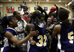 Waite celebrates its victory over Central Catholic. The Indians reached the City League final for the fi rst time since 1983.
