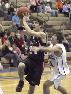 A.J. LaCourse of Cardinal Stritch drives past Continental's Scott Keck, but it was one of the few bright spots for Stritch.