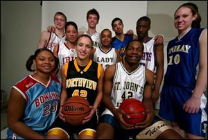 Northview s Niki McCoy and St. John s B.J. Raymond,
middle front, head the 2005 All-Blade basketball teams.
Also named were, from left, Bowsher s Stephany Johnson, Bowling Green s Ryan Hoehner, Central Catholic s Jessica Minnfield, St. John s Zach Hillesland,
Waite s Shareese Ulis, Libbey s Nate Miles, St. Francis 
Darryl Roberts and Findlay s Carlee Roethlisberger.
