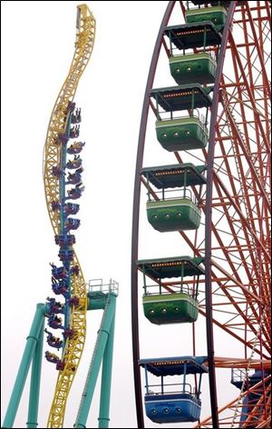 The owner of Cedar Point, home of the Wicked Twister, said the acquisition of Geauga Lake helped boost attendance.