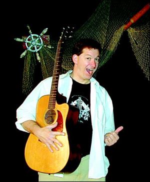 Ray Fogg, one of three artists
set to perform tomorrow,
mixes music and comedy.
