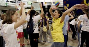 Jenny Schaffer, left, and Jackie Nemeth show no signs of fatigue during the event, which raised $162,234 for the Children's Miracle Network at Mercy Children's Hospital in Toledo.