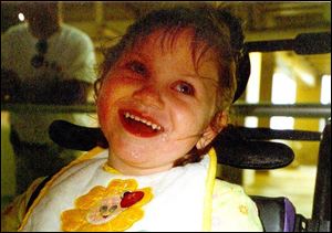 Victoria Flick, in this undated
family photo, was found dead
in her bed by her parents, who
sued the Toledo bed maker.