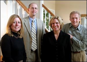 Sue Hetrick, Steve Shelly, and Peggy Esplin-Bentley, from left,
are the new members of the Sylvania school district Hall of
Fame. Eddie Boggs, right was honored as educator of the year.
