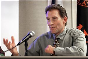Dr. Tim Reichard, the fired zoo veterinarian, found that canine behavior had relevance for his own situation.