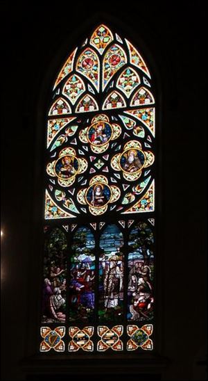 The full window measures 14 feet wide and 40 feet high.