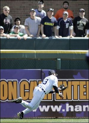 Marcus Thames not only provided four runs for Detroit with a grand slam, he kept theTribe from scoring with a diving catch.