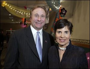 A REAGAN VISIT: Michael Reagan and Susan Palmer converse at the Toledo Children's Hospital event.