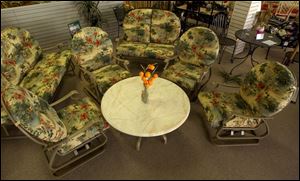 A  conversation table  has a large top at coffee-table height and is intended to be at the center of a group of chairs.