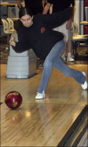 Anita Sharpe practices at Al-Mar Lanes. The Bowling Green senior earned All-Northern Lakes League second-team honors last season in a league which mostly has male bowlers.
