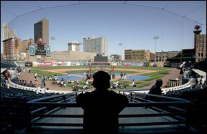 Eric Zmuda, 10, looks out to his field of dreams before the start of the Mud Hens  home opener yesterday at Fifth Third Field.
