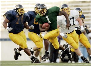 UT QB Marques Council breaks loose for a big gain. Council and Clint Cochran filled in for a rehabbing Bruce Gradkowski.